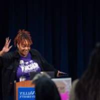 Girls of Color Summit previous event and a women behind a podium speaking